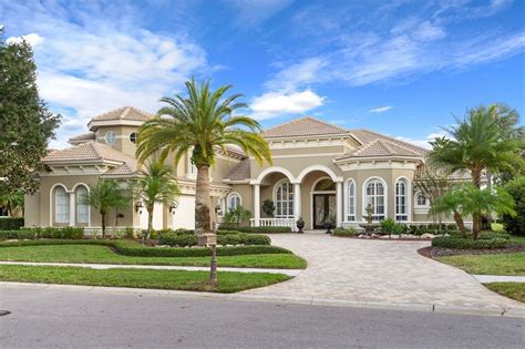 BOND PAID on this STUNNING 3/2 EXPANDED WILLIAMSBURG PREMIER with a 3 CAR GARAGE located in the VILLAGE OF OSCEOLA HILLS AT SOARING EAGLE PRESERVE. . Redfin florida